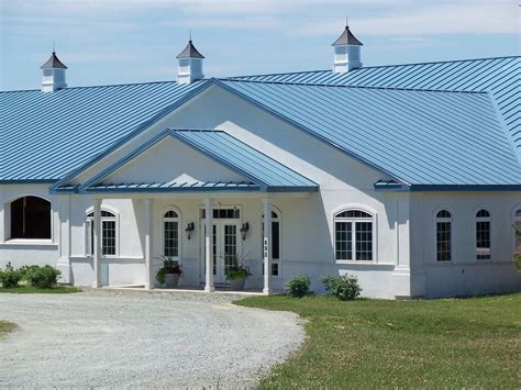 blue house black metal roof|blue metal roof houses pictures.